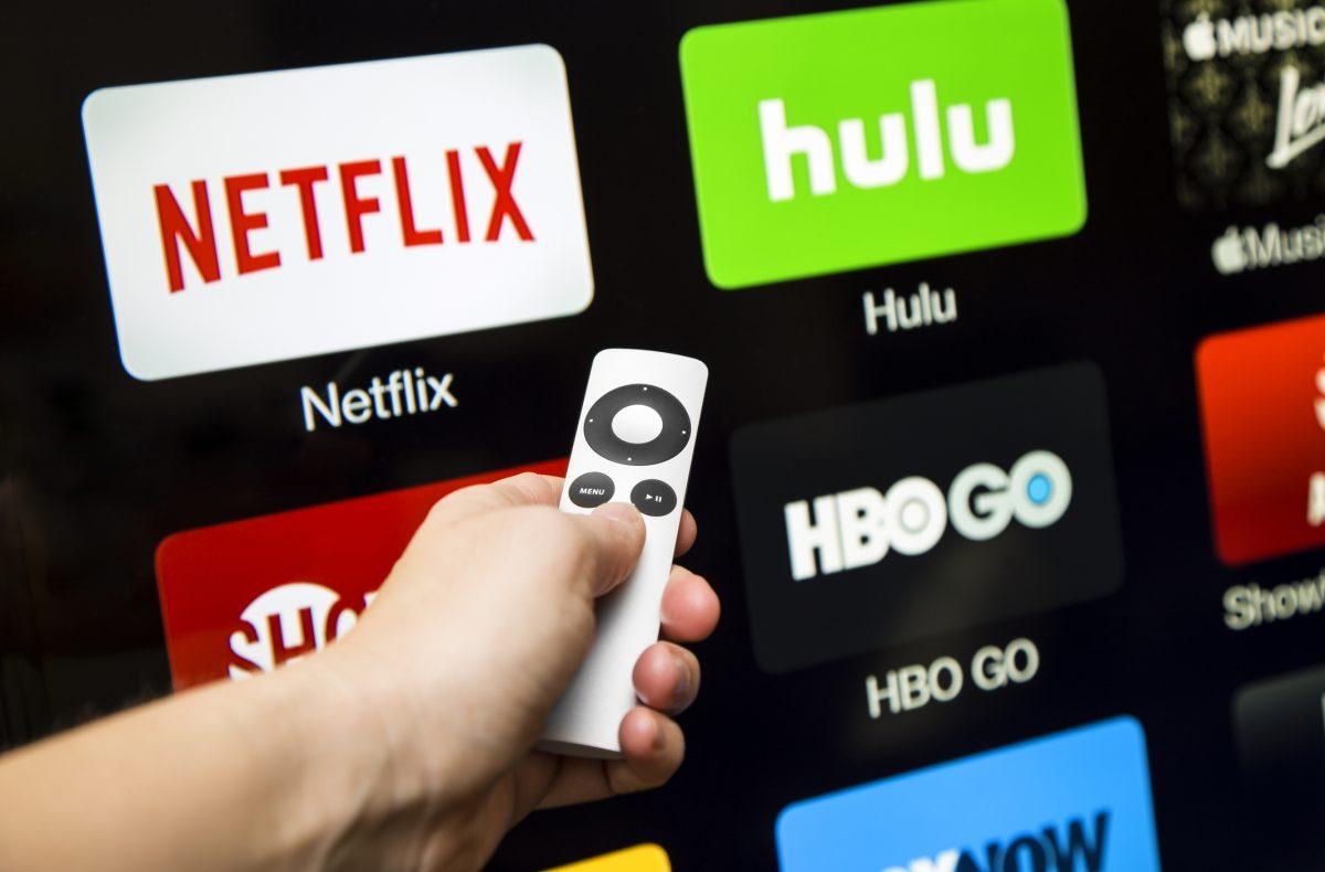 Canton, GA, USA - October 4, 2015 Netflix, hulu, and hbo subscription streaming video service accessed through a Apple tv and displayed on a hd tv.  These application are paid services popular with cable cutters as an alternative to paying for cable.